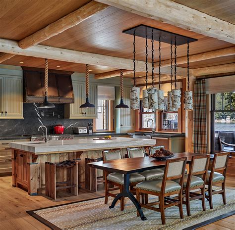 Lake house kitchen - New Hampshire Lake House. Cummings Architecture + Interiors. Situated on the edge of New Hampshire’s beautiful Lake Sunapee, this Craftsman-style shingle lake house peeks out from the towering pine trees that surround it. When the clients approached Cummings Architects, the lot consisted of 3 run-down buildings.